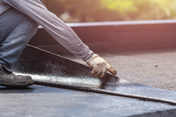 Professional Waterproofing technician working in Iberia, OH